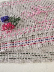 Various simple embroidery stitches on canvas