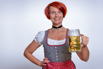 Happy Woman Holding a Mug of Cold Beer