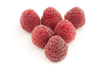 red raspberry lying in form of pyramid 