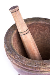 wooden mortar and pestle isolated on white background