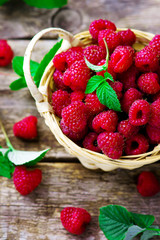 fresh raspberry in to the basket