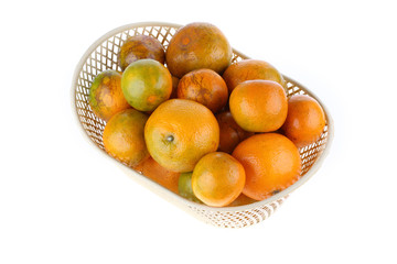 orange fruit in basket, isolated on white background