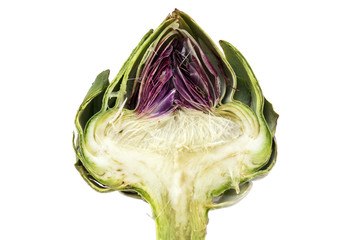 Obraz premium half artichoke, showing the heart and choke under the leaves, is