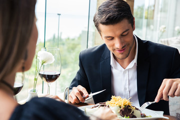 Couple eating in restaurant
