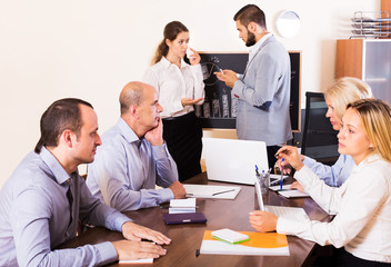 upset business team in office