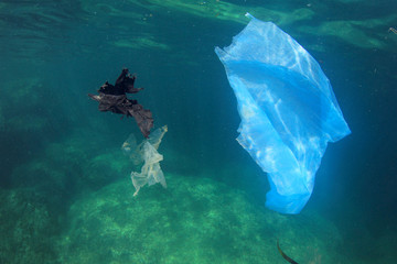 Plastic bags trash rubbish garbage pollution in ocean