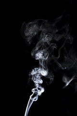 gray smoke on a black background.