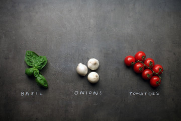Italian tricolor made from fresh vegetables - basil, onion and tomatoes