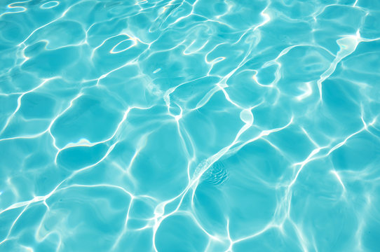 Blue water surface in swimming pool