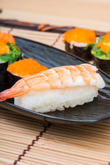 sushi in black dish