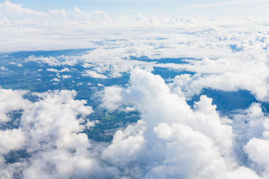 Top view from The airplane blue sky and white cloud © Sirichai Puangsuwan