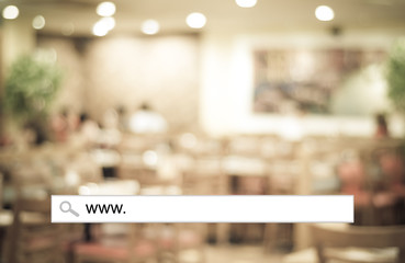 Word www. written on search bar over blur restaurant background