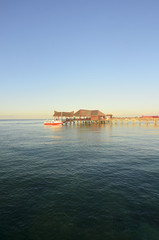 Obraz premium Long pier dan beautiful coral at Mabul Island