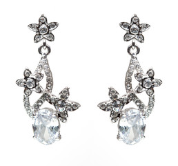 earrings with Briliant on the white