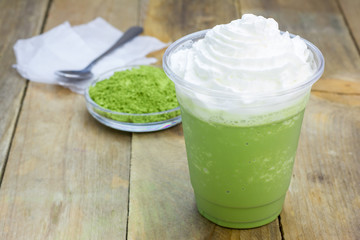 Homemade green tea frappe in plastic cup