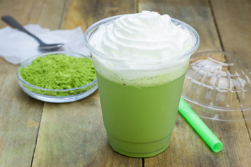 Homemade green tea frappe in plastic cup