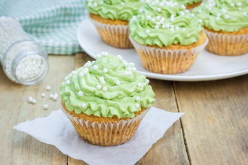 Healthy muffins with ricotta cheese and matcha frosting