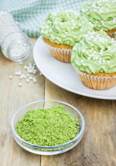 Obraz na płótnie Canvas Healthy muffins with ricotta cheese and matcha frosting