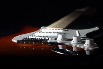 Electric guitar on dark background
