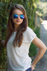 Beautiful smiling girl in white blouse