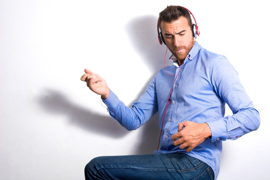 Man Playing Air Guitar