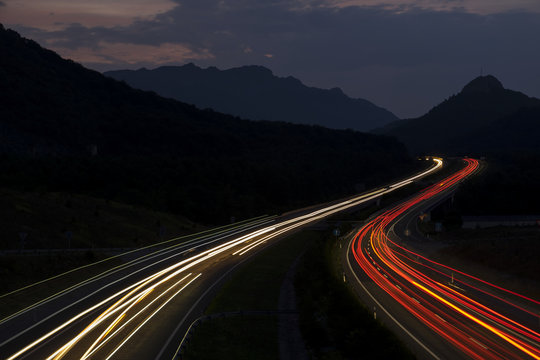 Car lights in the road at night, A1, Navarra.