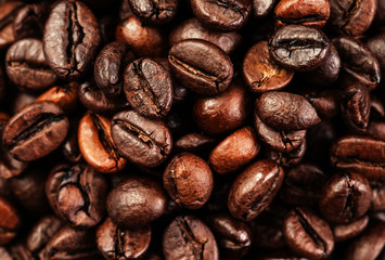Roasted coffee beans, can be used as a background.  Coffee beans