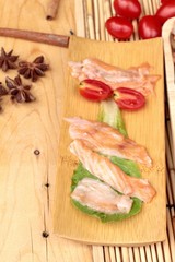 Salmon head for cooking and fresh salmon fillets .