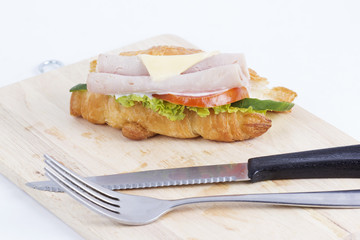 croissant sandwich with ham cheese