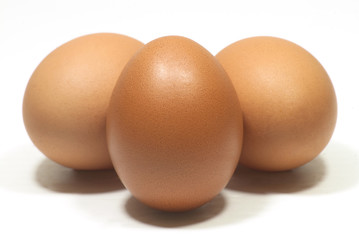 three eggs isolated on white background