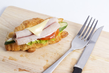 croissant sandwich with ham cheese