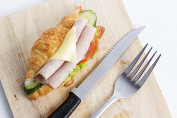 croissant sandwich with ham cheese