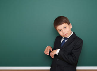 school boy portrait near board
