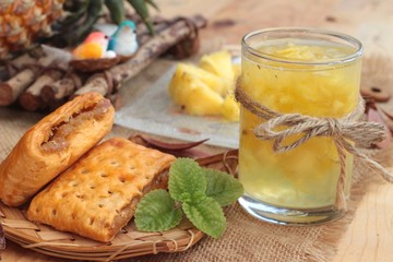 Pineapple juice and fresh pineapple with bread baked with pineap