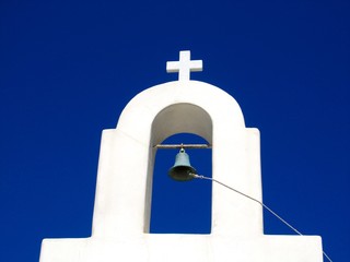 white Greek Orthodox Church on dark blue sky © hydraviridis