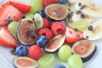 Fresh fruit plate with figs and berries