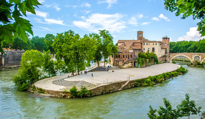 isola tiberina is the biggest island of tibera river in rome. This small island is attractive touristic spot on the way to trastevere district. © dudlajzov