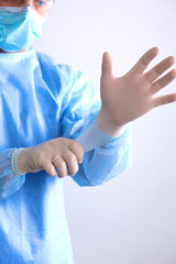 Fototapeta premium Surgeon in uniform close-up ready to step