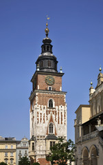 Fototapeta na wymiar Townhouse tower on Main square in Krakow. Poland