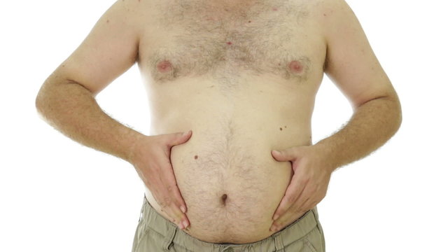 Obese man squeezing sides of  fat stomach
