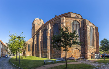 Fototapeta na wymiar gothic St Petri church in Wolgast under blue sky