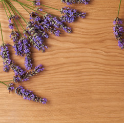 Lavender flowers on vintage wooden boards background