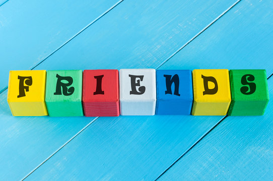 Friends - word on children's colourful cubes or blocks