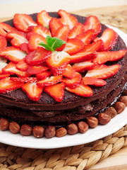 Homemade chocolate cake with strawberries