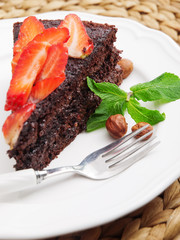 Homemade chocolate cake with strawberries