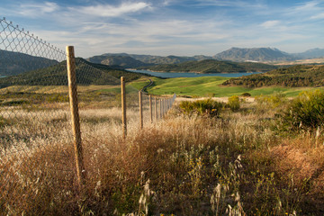 Fototapeta na wymiar Horizontal shot of fence in beautiful Andalusia landscape in Spa
