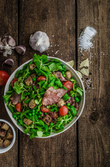 Fresh salad with bacon and croutons