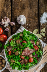 Fresh salad with bacon and croutons