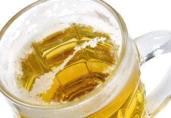 Beer head shaped as Norway in a beer mug.(series)