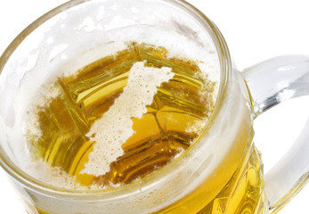 Beer head shaped as Portugal in a beer mug.(series)